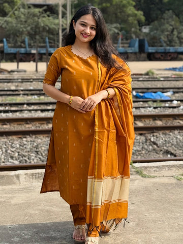 Golden Raw Silk Kurti With Potli Balls On Neck & Sleeve