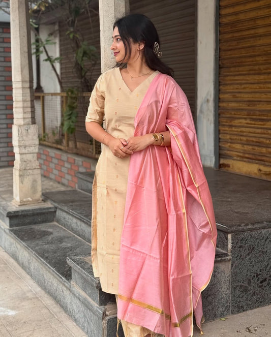 Cream Colour Raw Silk Kurti With Delicate Golden Colour Butta.