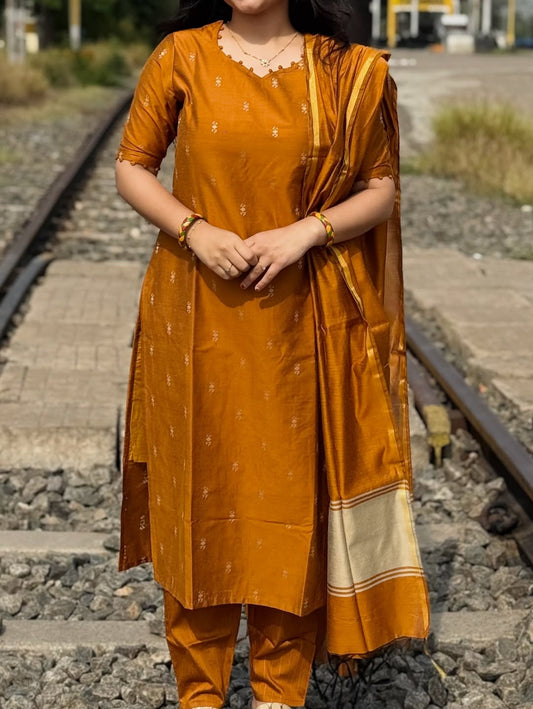 Golden Raw Silk Kurti With Potli Balls On Neck & Sleeve
